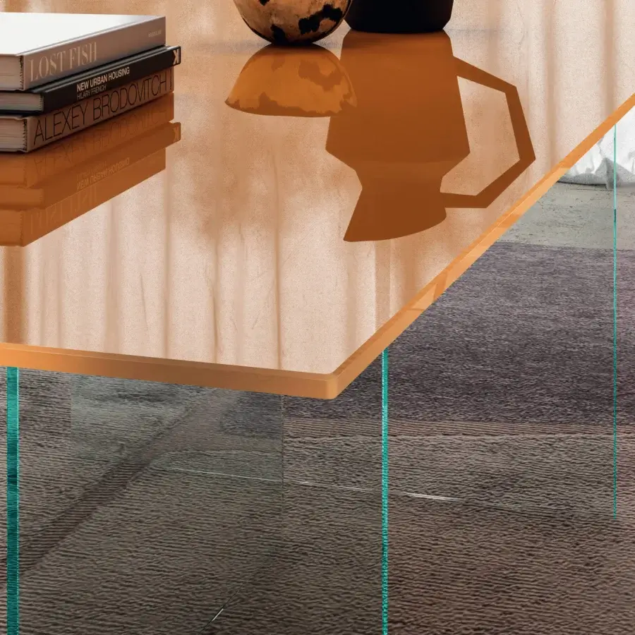Distinguished Lago Air Slim table with warm brown tabletop and transparent glass legs exhibiting a slim tempered-glass surface