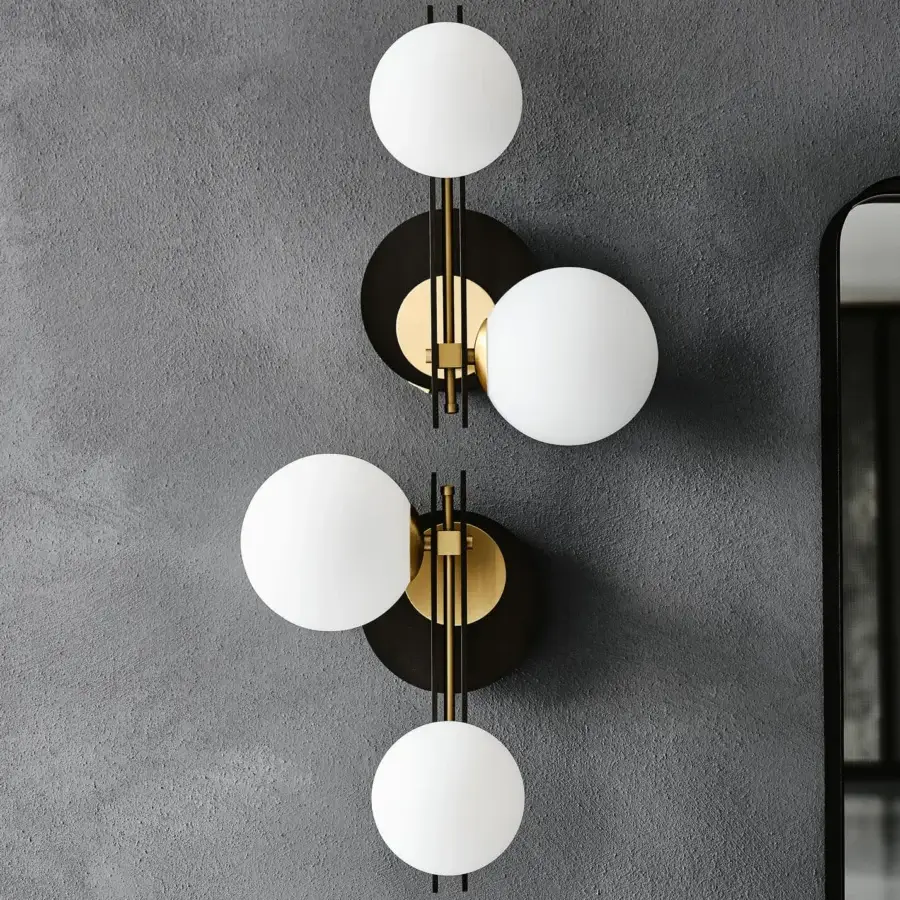 Distinguished Cattelan Italia Planeta wall lamp with burnished steel and brushed brass accents, showcasing stacked satin white blown glass shades