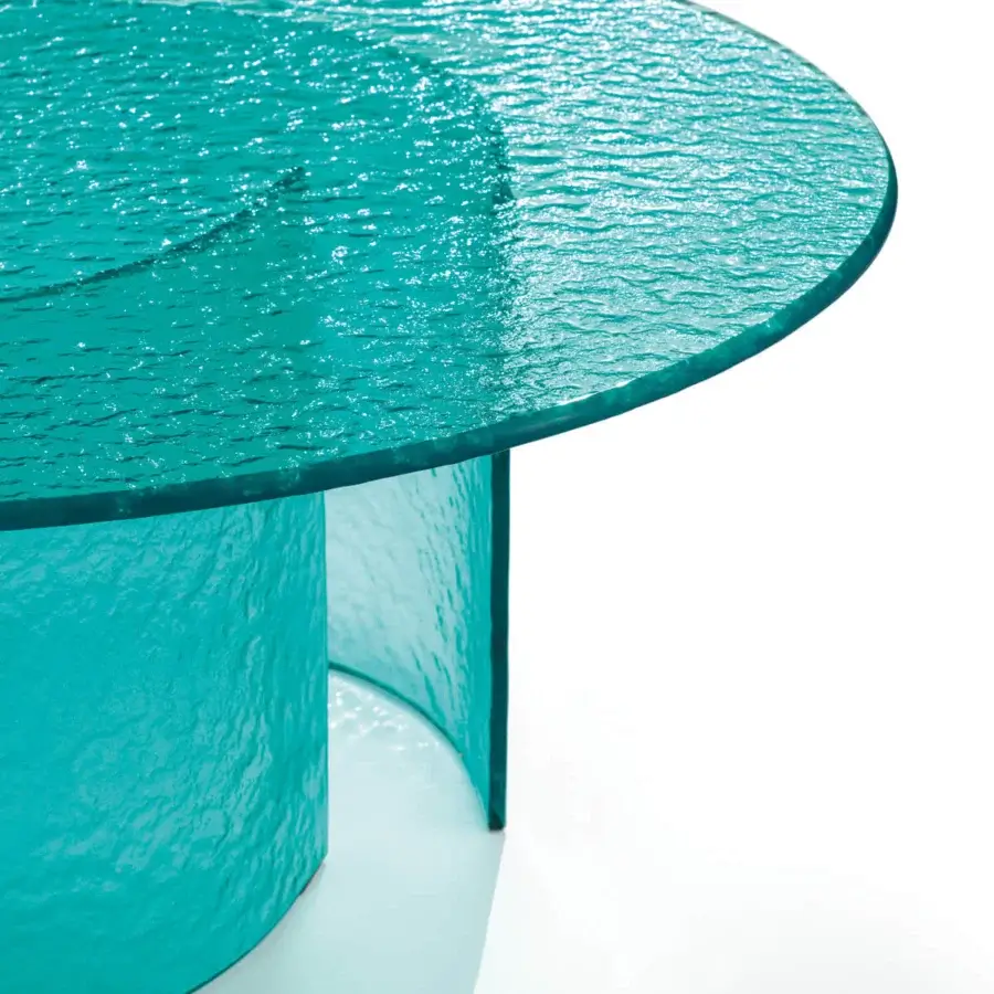 Distinguished Reflex Petalo Acqua coffee table with teal Acqua glass and gracefully curved base crafted with a unique textured finish