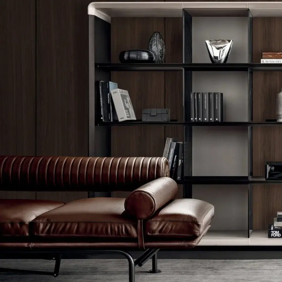 Superior 4 Mariani Up & Down sofa built with rich brown leather, minimalist black metal frame and cylindrical bolster cushion with leather straps