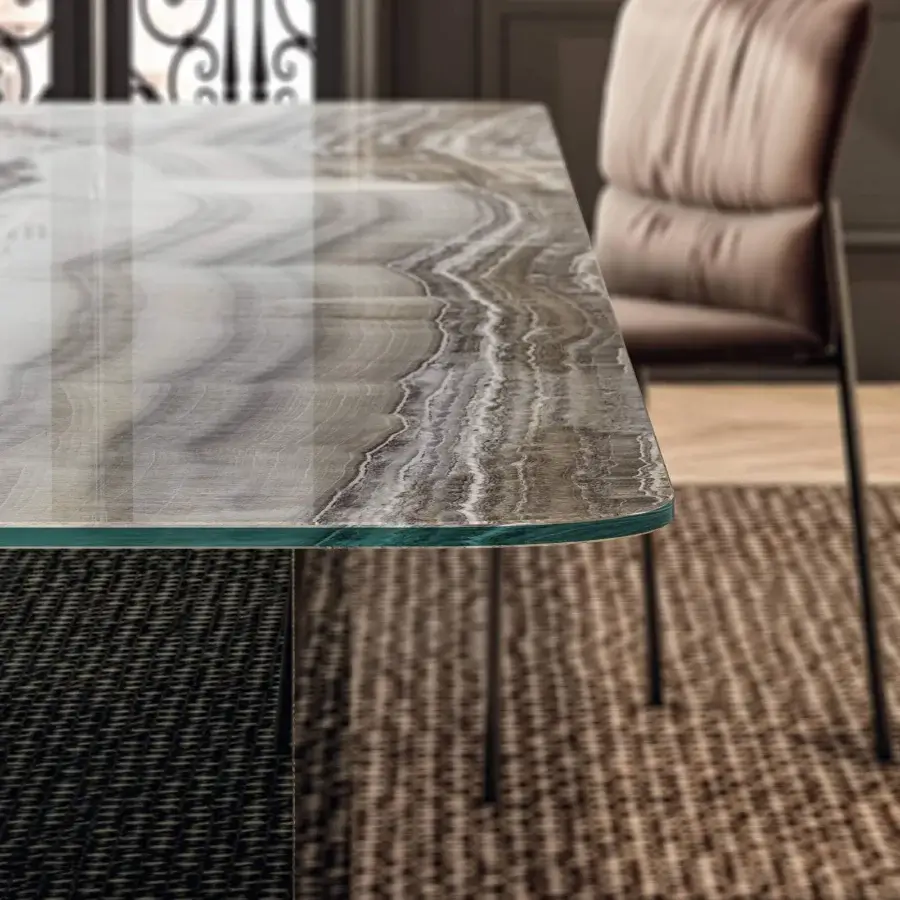 Superior Lago Air Soft table with swirling gray and brown XGlass top, green glass trim and dark metal legs with woven base