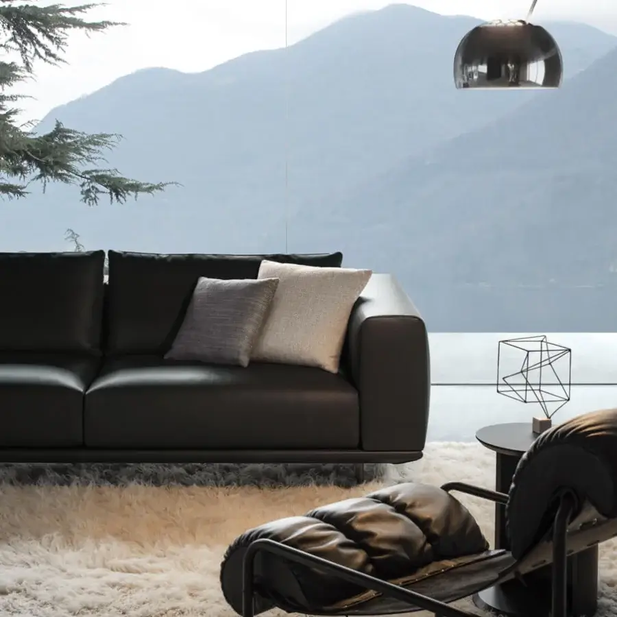 Exceptional 4 Mariani Asso sectional with essential lines upholstered in smooth matte black leather and gray textile cushions