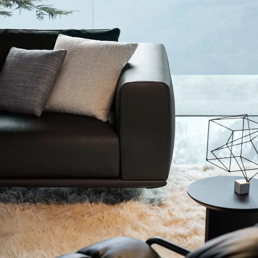 Lavish 4 Mariani Asso sectional with suspended design and supple dark brown leather upholstery exhibiting rounded edges