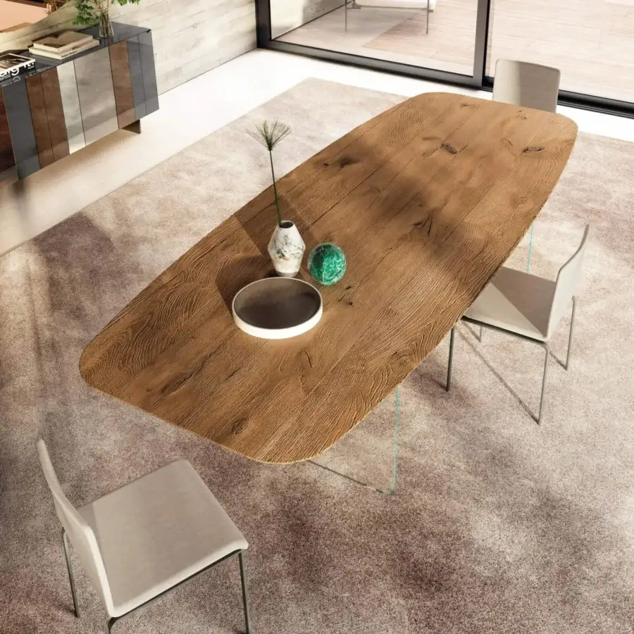 Superior Lago Air Soft Shaped table with slender tempered-glass legs and a light brown wood finish showcasing natural tone variation