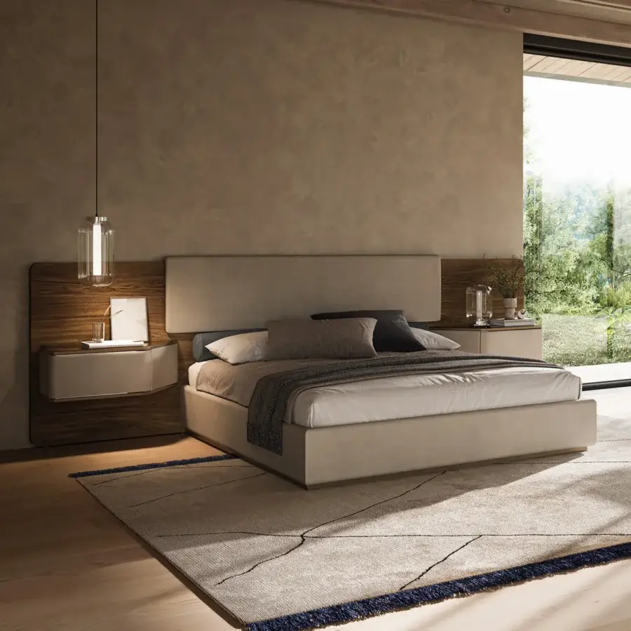 Exceptional Reflex Wave XL bed with light beige upholstery and polished steel details crafted in Italy