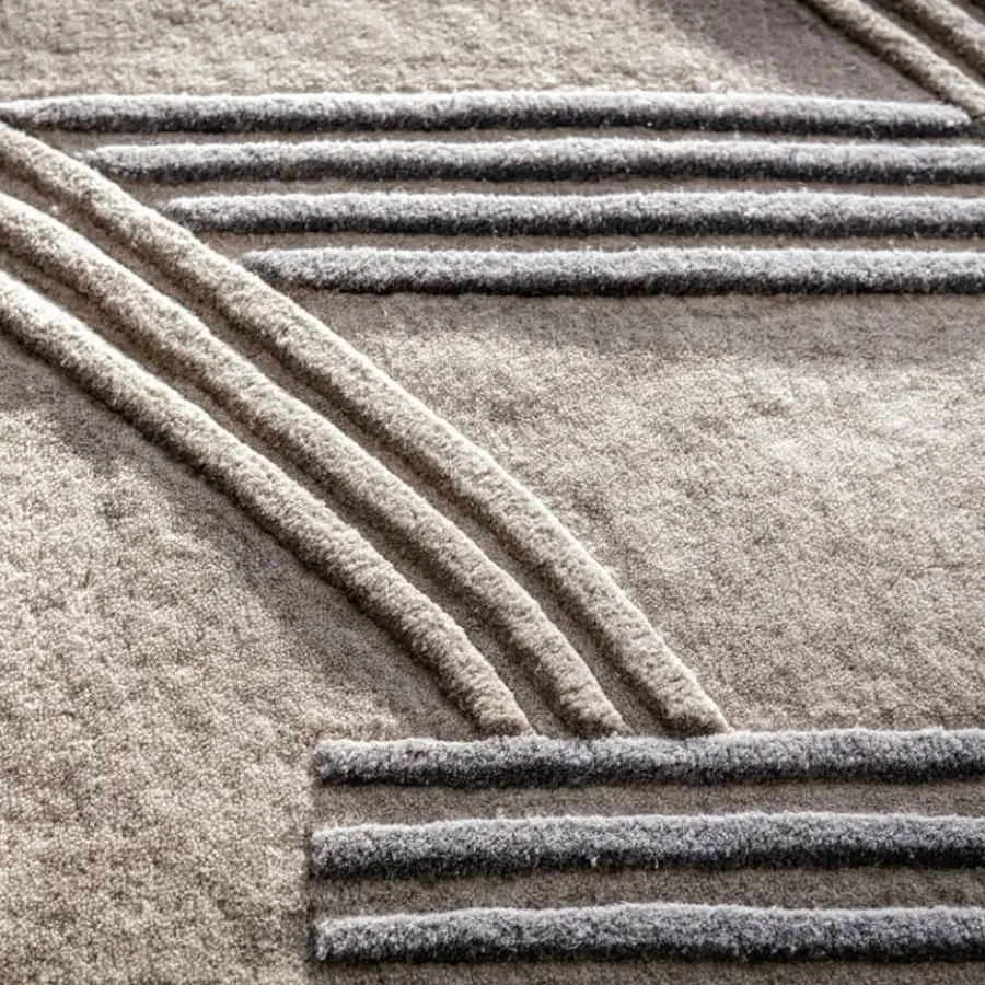 Elegant Bizzotto Italia Drop rug with geometric motifs stamped in wool and viscose featuring high-low relief effects and contrasting tones