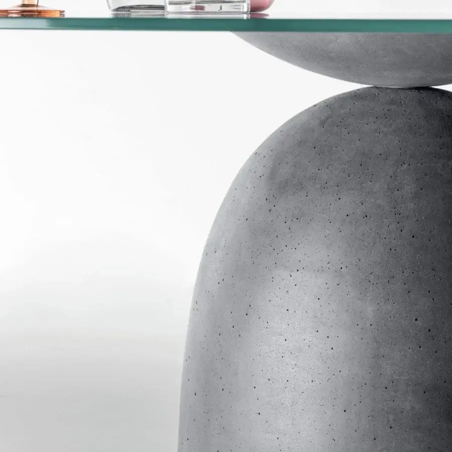 Superior Lago Janeiro table with clear glass top and sculptural concrete base in natural anthracite finish