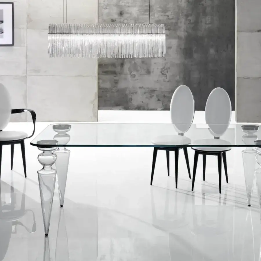 Elegant Reflex Gran Canal table with transparent glass top and hourglass-shaped Murano glass legs crafted in Italy