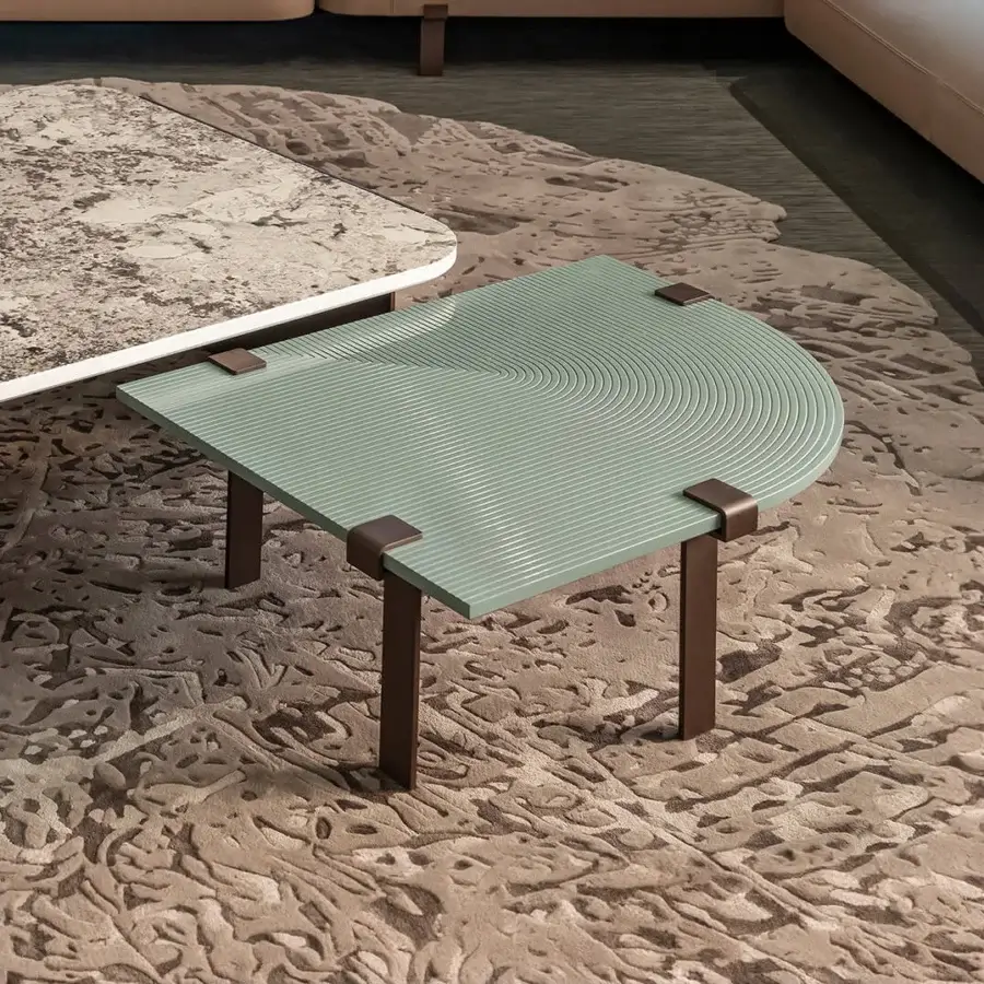 Distinguished Bizzotto Italia Amulet coffee table with a muted green synthetic tabletop and matte finish built on cylindrical brown metal legs