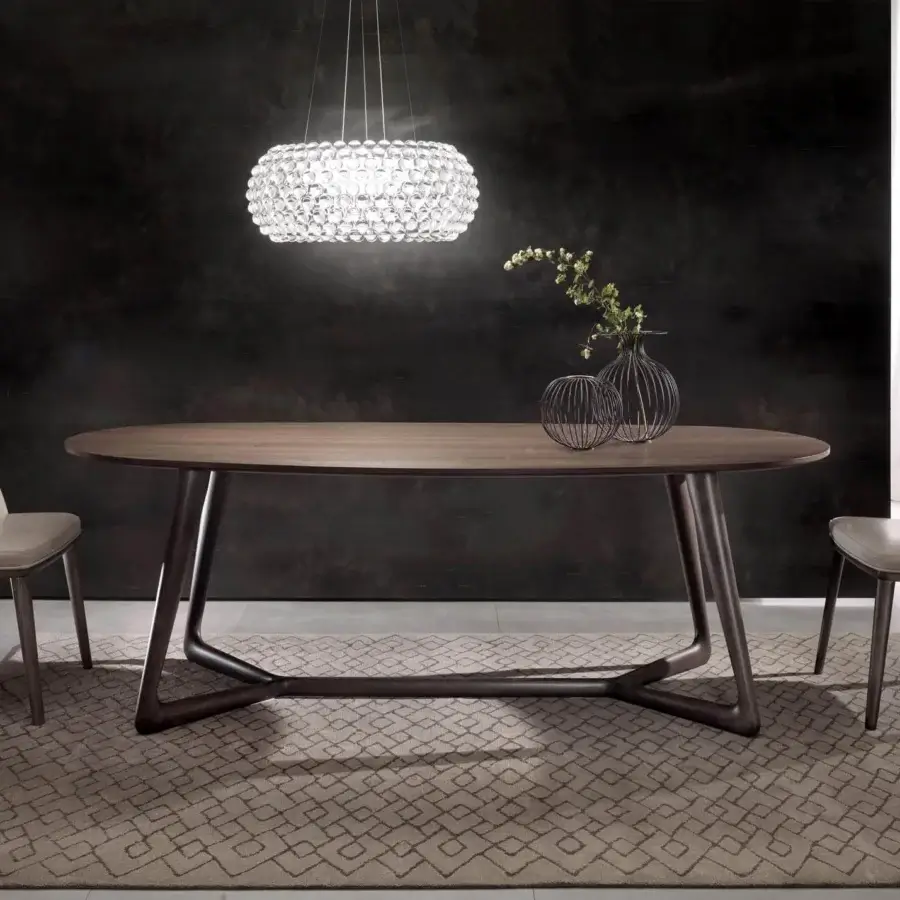 Exceptional Pacini & Cappellini Cover table with oval dark brown veneered ash wood and inclined solid ash base