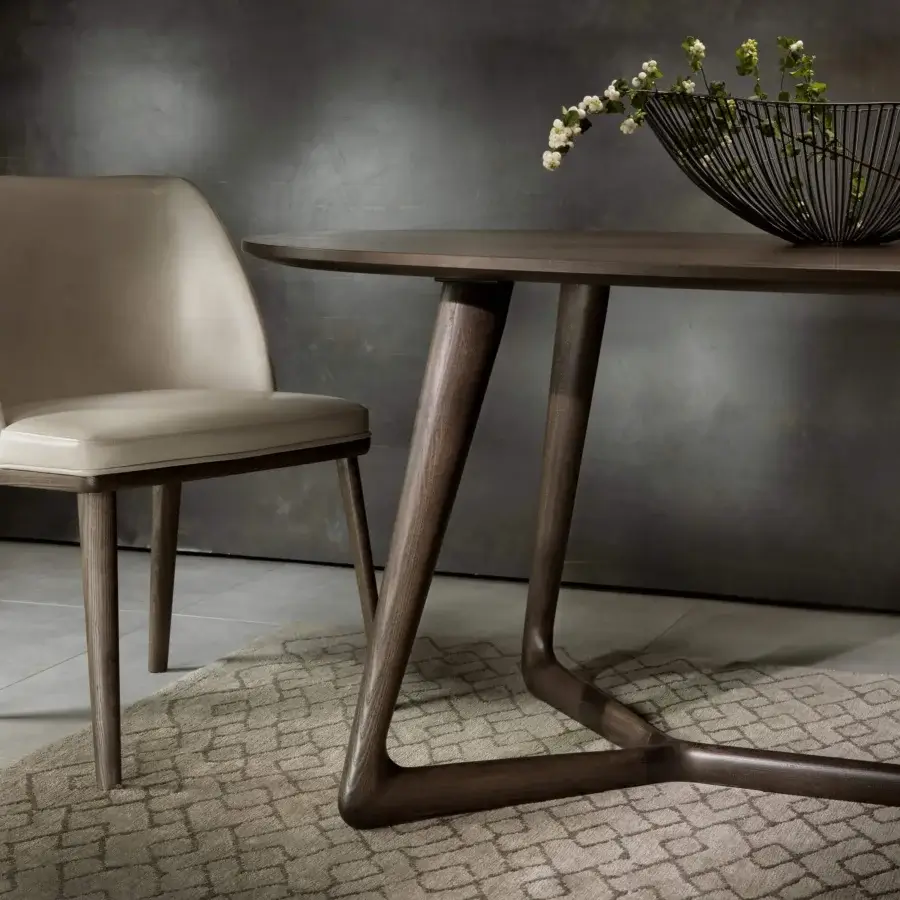 Elegant Pacini & Cappellini Cover table with dark brown veneered ash wood top and curved solid ash wood legs crafted in Italy