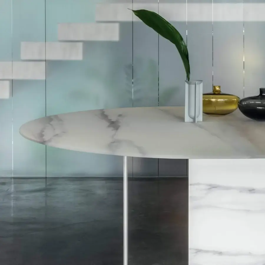 Exceptional Lago Stratum table with round XGlass top mimicking marble and slender stratified glass support