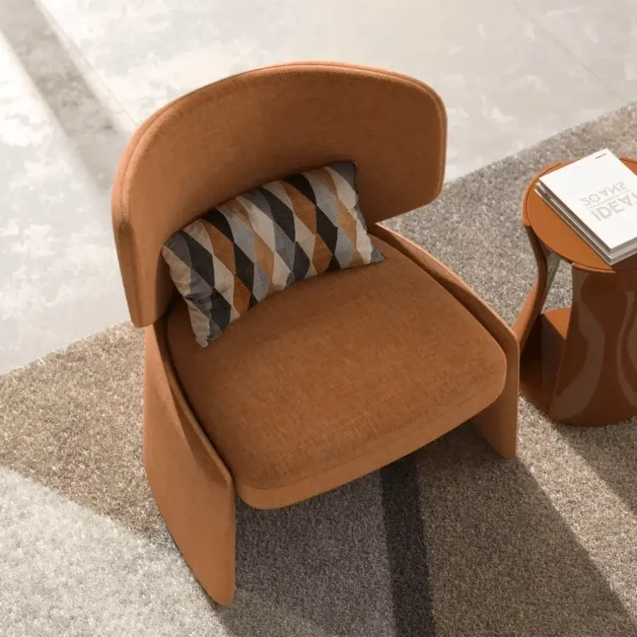 Superior CPRN Homood Emilia lounge chair in warm orange plain weave fabric with geometric lumbar cushion and metal base