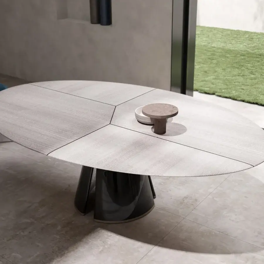 Distinguished CPRN Homood Talos table with oval silhouette crafted in light gray composite and glossy metal base