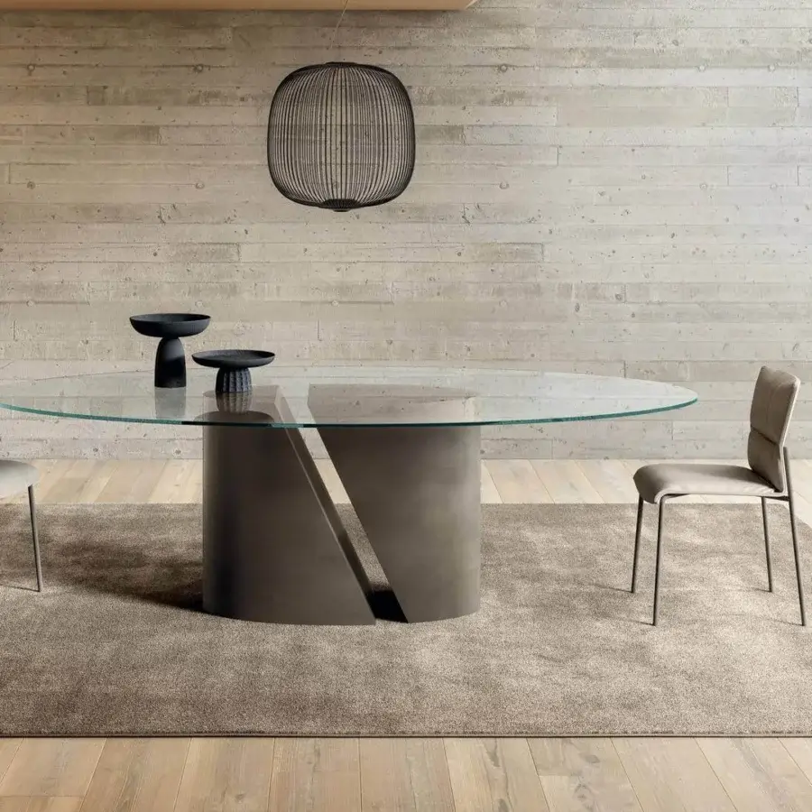 Elegant Lago Wadi elliptical table with light glass and a dark gray divided base crafted in Italy