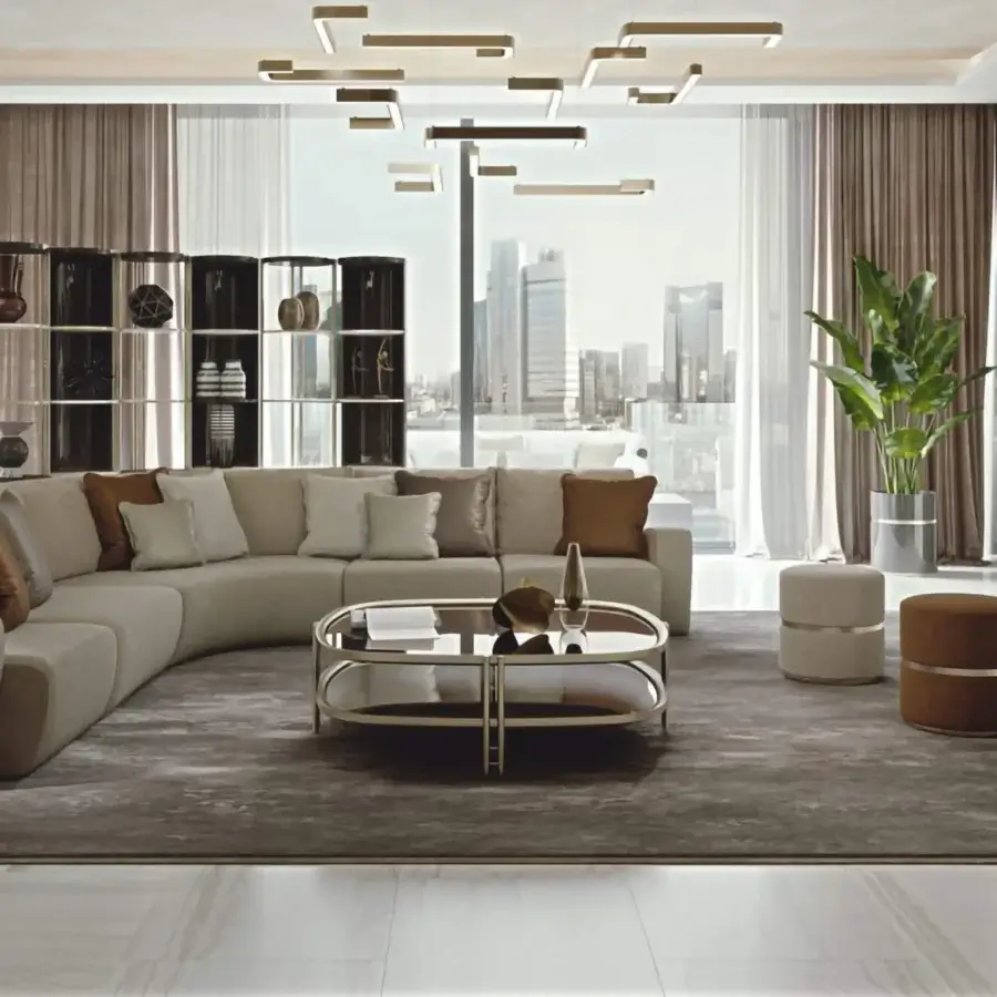 Elegant Bizzotto Italia Ikat coffee table with rounded oval form and light gold glossy metal frame with transparent glass