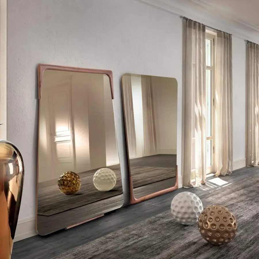 Exceptional Pacini & Cappellini Destiny mirror with a trapezoidal shape and warm copper toned wooden frame