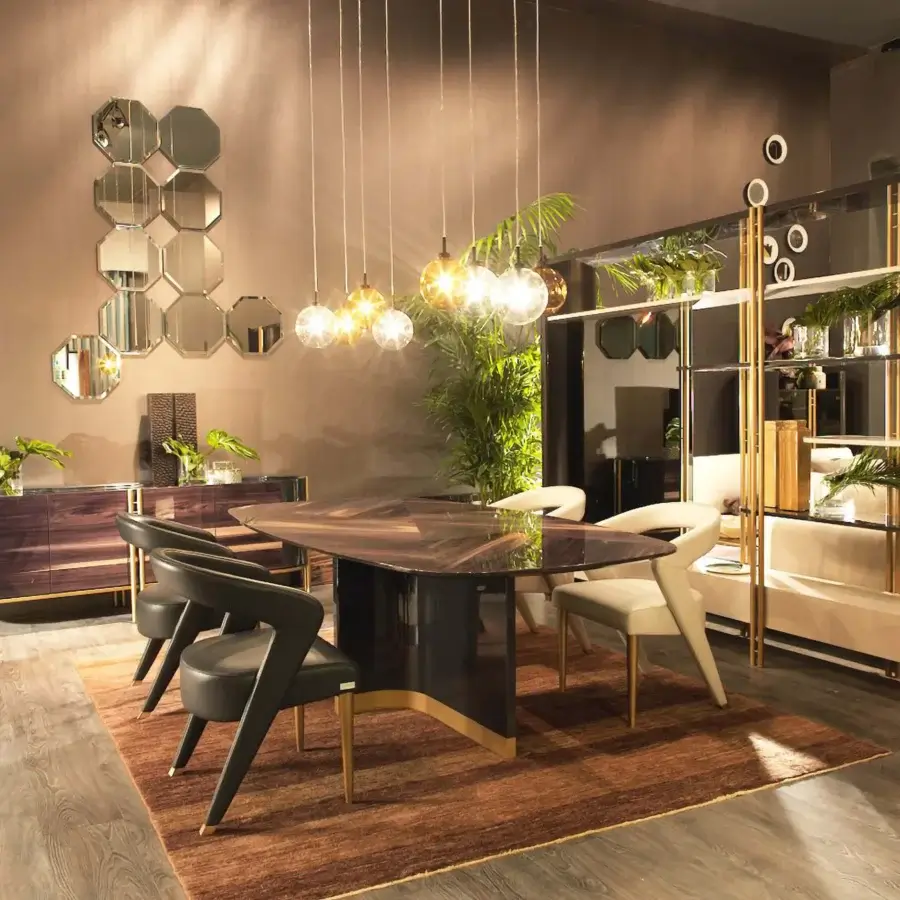 Distinguished Bizzotto Italia Ikat dining table with glossy, elongated triangular wood top and dark reflective double-S base crafted with gold accents