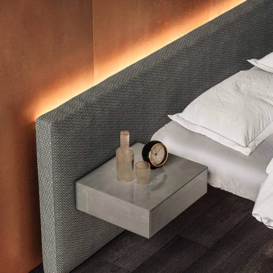 Superior Lago Air bed with patterned gray textile headboard, extra-clear tempered glass supports and integrated light gray nightstand