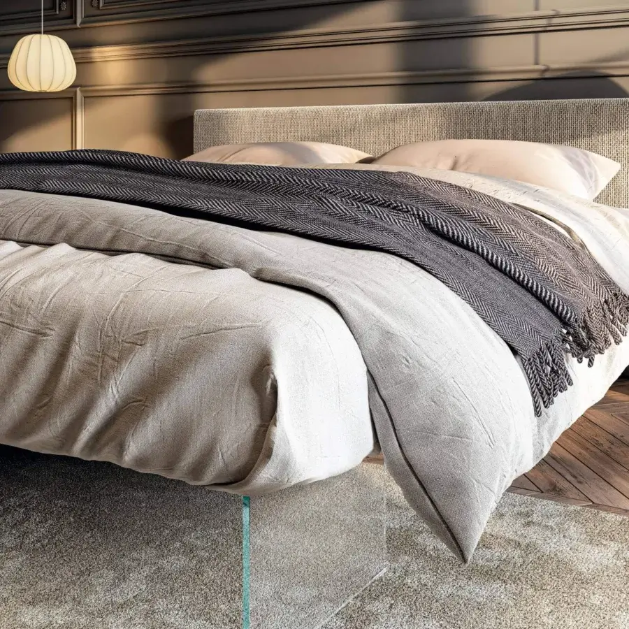 Distinguished Lago Air bed with light beige textured fabric upholstery, extra-clear tempered glass supports and woven headboard