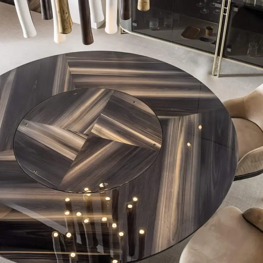 Distinguished Bizzotto Italia Ikat dining table with a captivating radial pattern in dark gray and brown tones and glossy finish