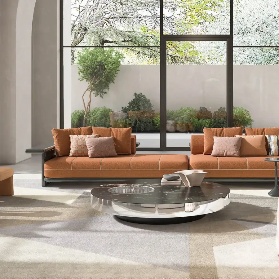 Distinguished CPRN Homood Willy coffee table with shiny steel supporting dark marble creating a reflective surface