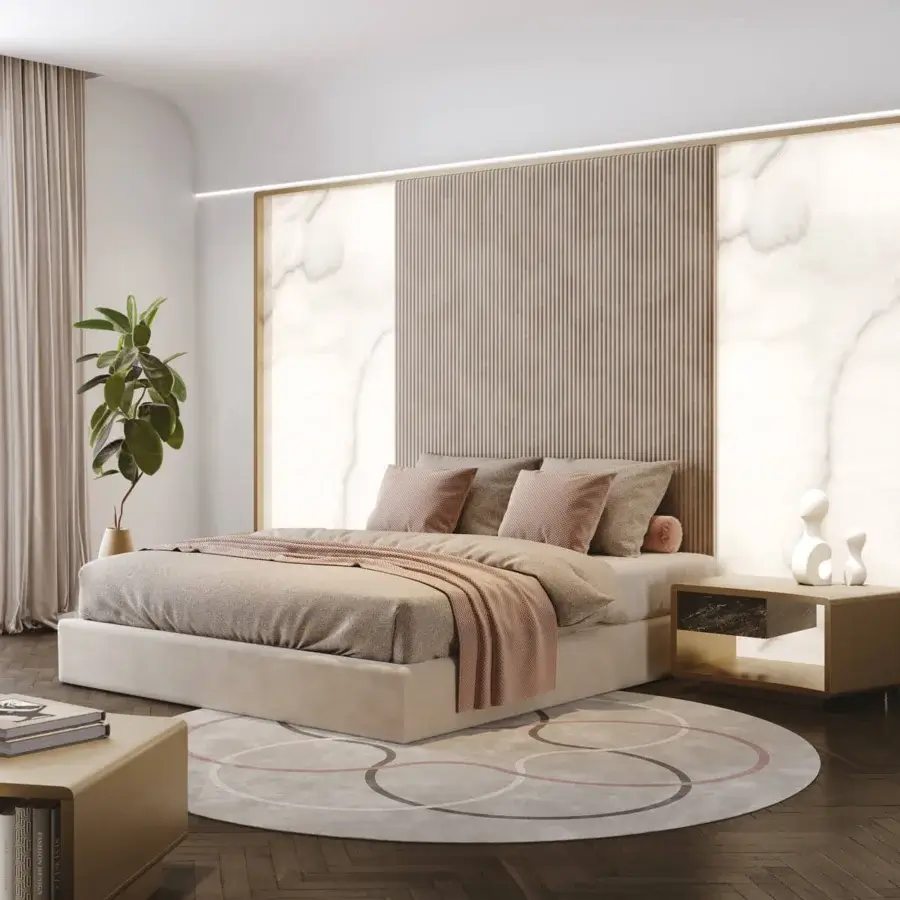 Exceptional Reflex Space XL bed with padded beige textile, quilted tan panel and illuminated translucent white MarmoReflex wings framed in bronze