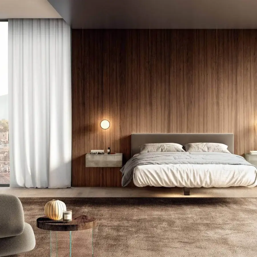 Distinguished Lago Fluttua bed with a height-adjustable central support and imperceptible HPL base upholstered in light taupe textile
