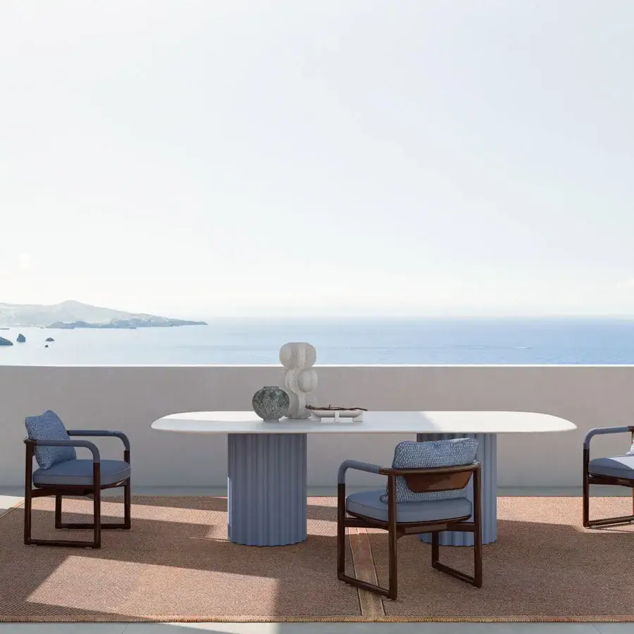 Distinguished CPRN Homood Pablo table with a smooth white marble top and muted blue lacquered fluted base