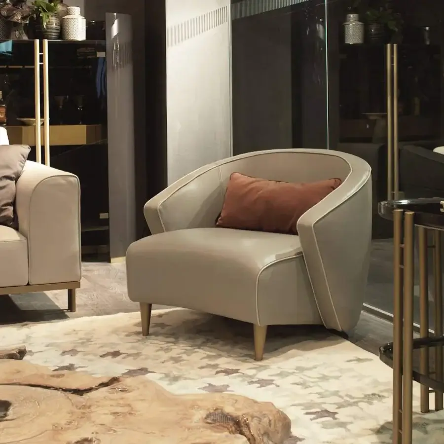 Superior Bizzotto Italia Wave lounge chair upholstered in light taupe fabric with smooth matte finish and lacquered metal legs