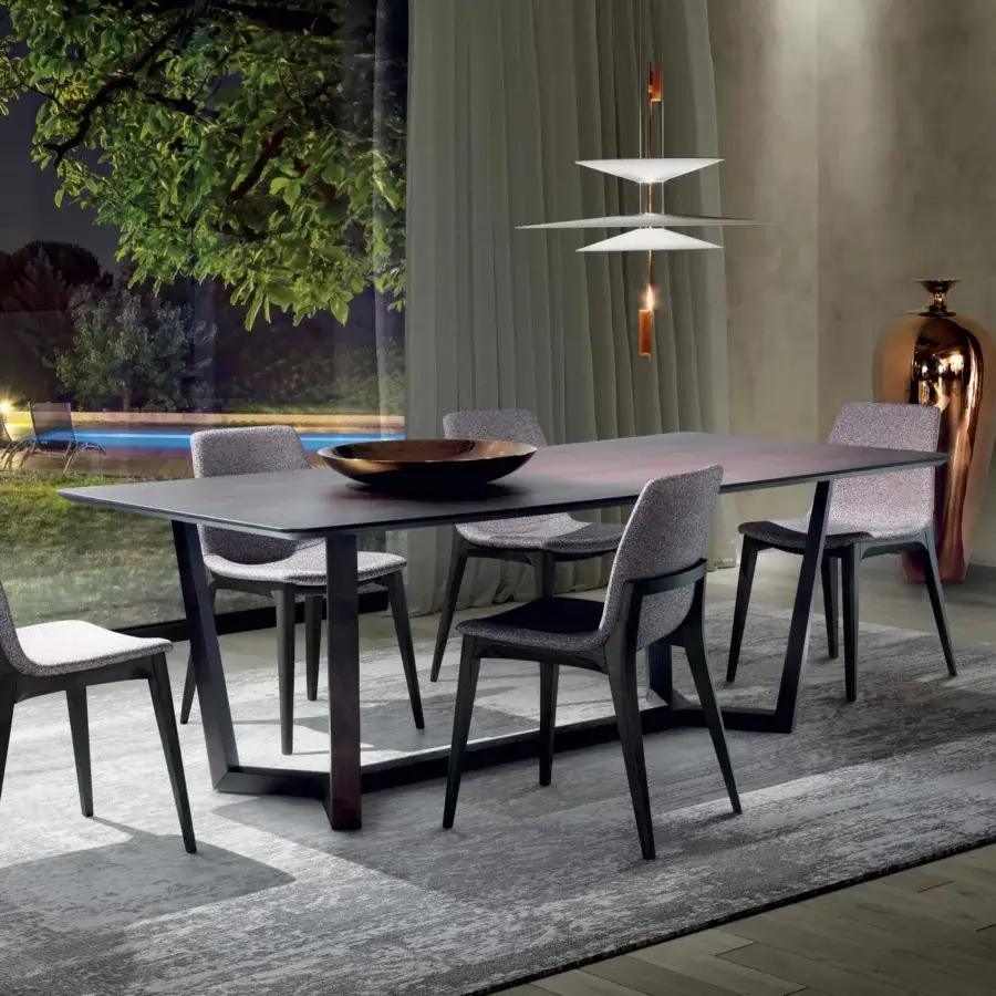 Harmonious Pacini & Cappellini Aliante table with wood veneered ash top and solid ash support built in dark tones