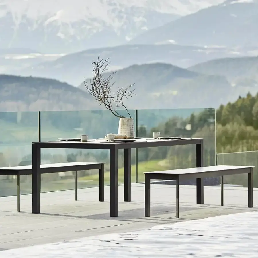 Elegant Varaschin System bench with dark gray powder-coated aluminum frame and smooth HPL rectangular seat
