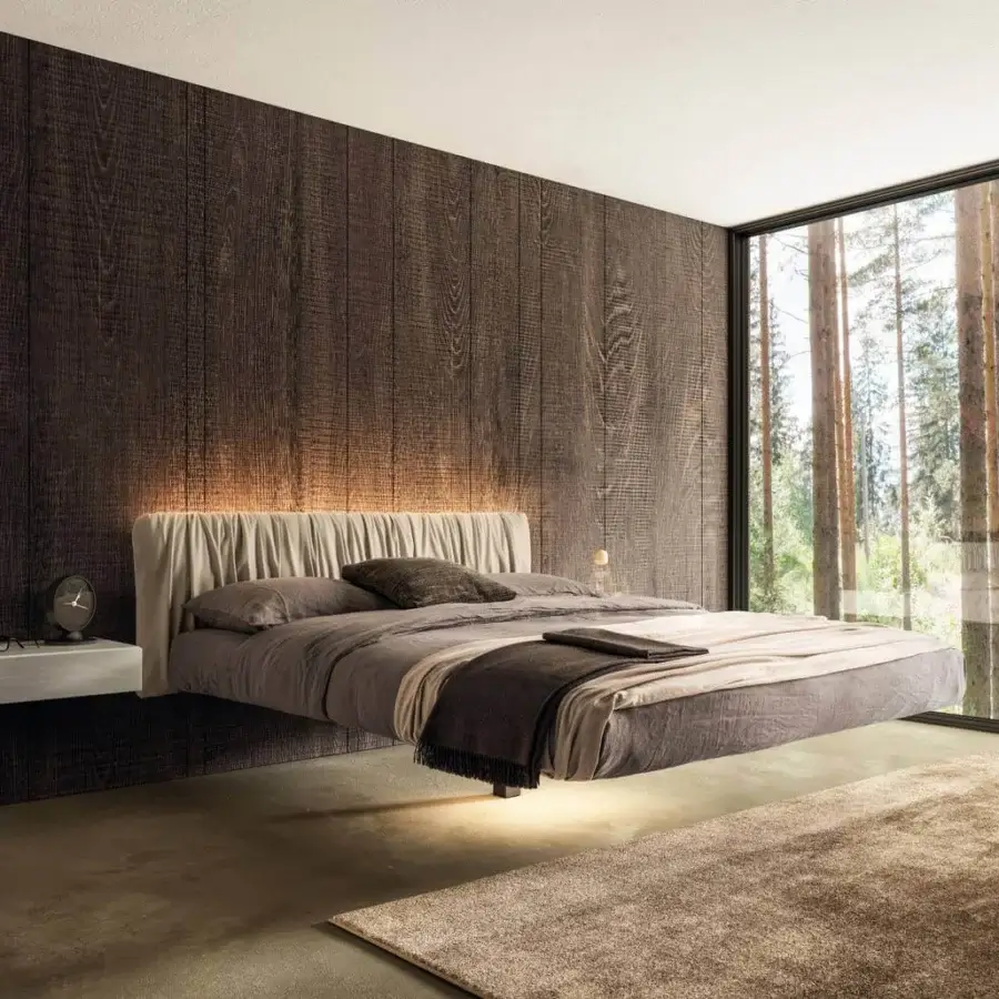 Innovative Lago Fluttua Replis bed with calming matte gray textile upholstery and vertically pleated headboard built with an HPL base