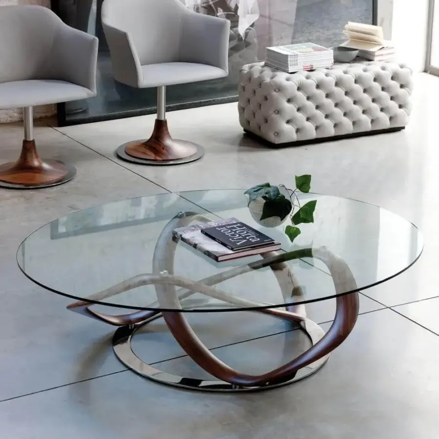 Elegant Porada Infinity coffee table with clear glass and Canaletta Walnut Wengé stained, showcasing looping wood elements encased in chrome plated metal