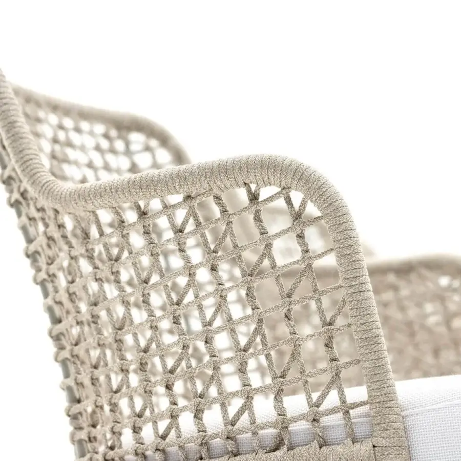 Superior Varaschin Emma chair with a light beige hand-woven fiber backrest and comfortable white cushion seat built with powder-coated aluminum