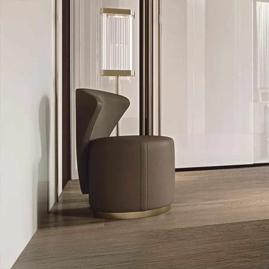 Superior Bizzotto Italia Ginko chair with flowing seat and angled backrest in matte dark brown half-grain natural leather with golden metallic accent
