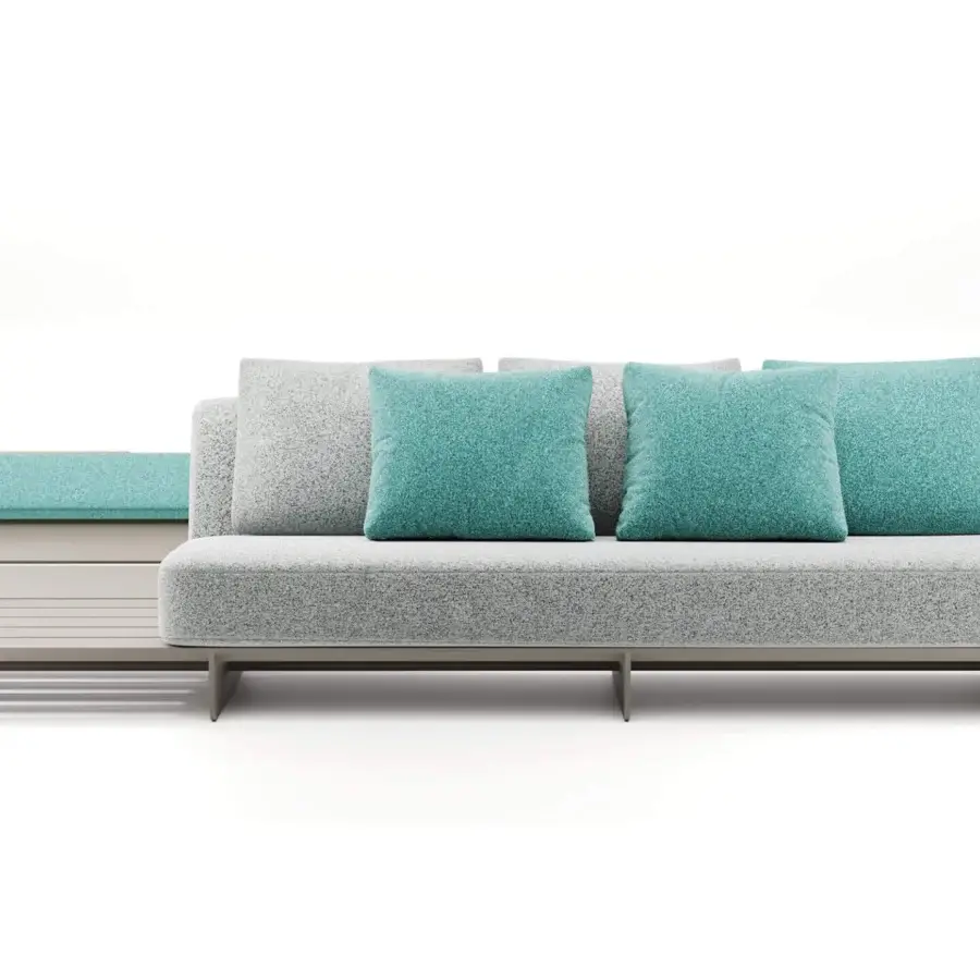 Exceptional Reflex Segno sofa with light gray solid surface and outdoor fabric upholstery accented with teal cushions