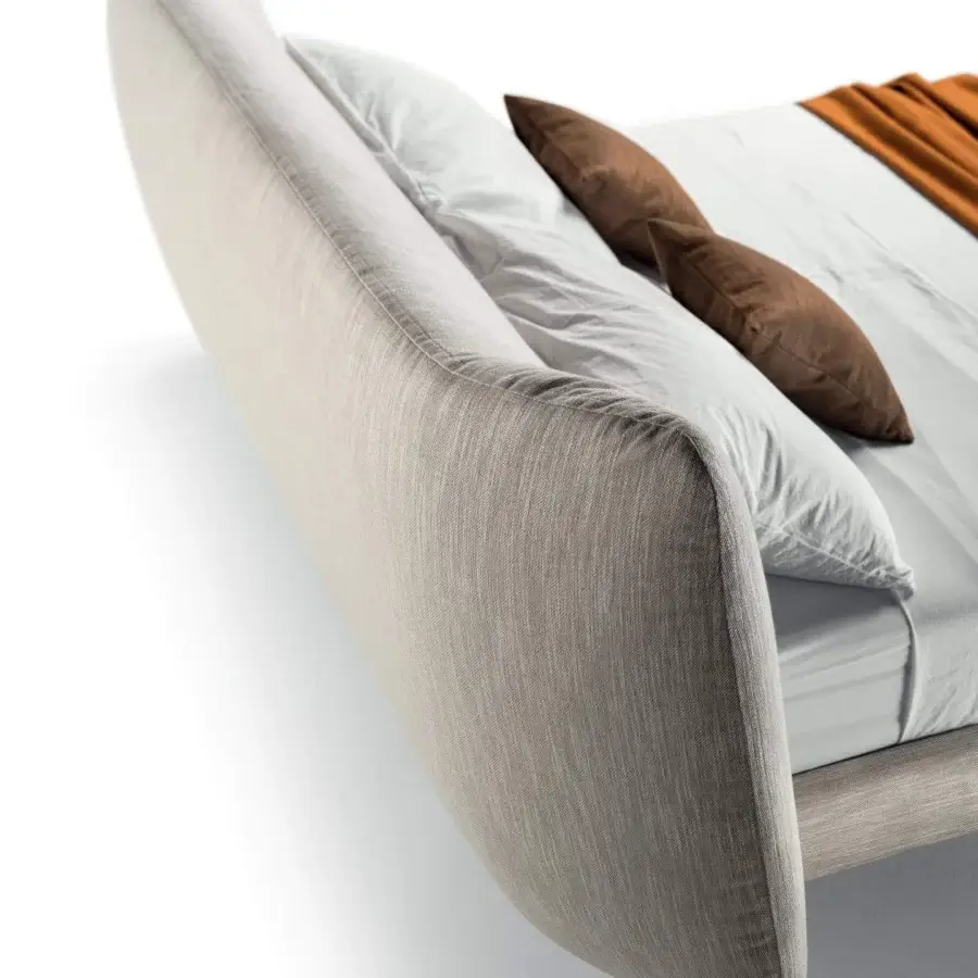 Superior Lago Bed-In bed with textured light beige textile upholstery, meticulous tailoring and flared frame shaping