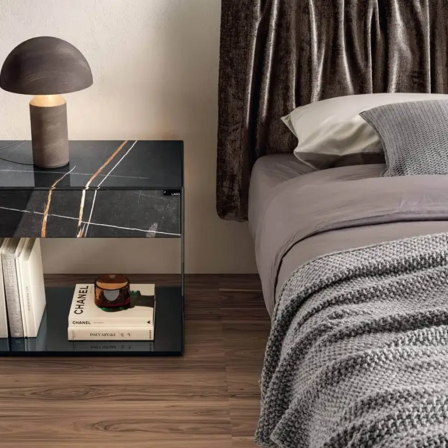 Innovative Lago UpGlass nightstand with tempered glass frame and black marble XGlass top exhibiting white and gold veining