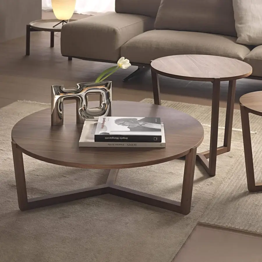 Distinguished Pacini & Cappellini Denny coffee table with a three-legged solid wood structure and veneered wood top in a medium-toned brown finish