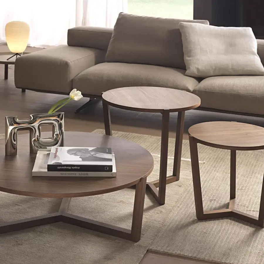 Elegant Pacini & Cappellini Denny coffee table with a three-legged solid wood structure and veneered wood top in medium brown tone