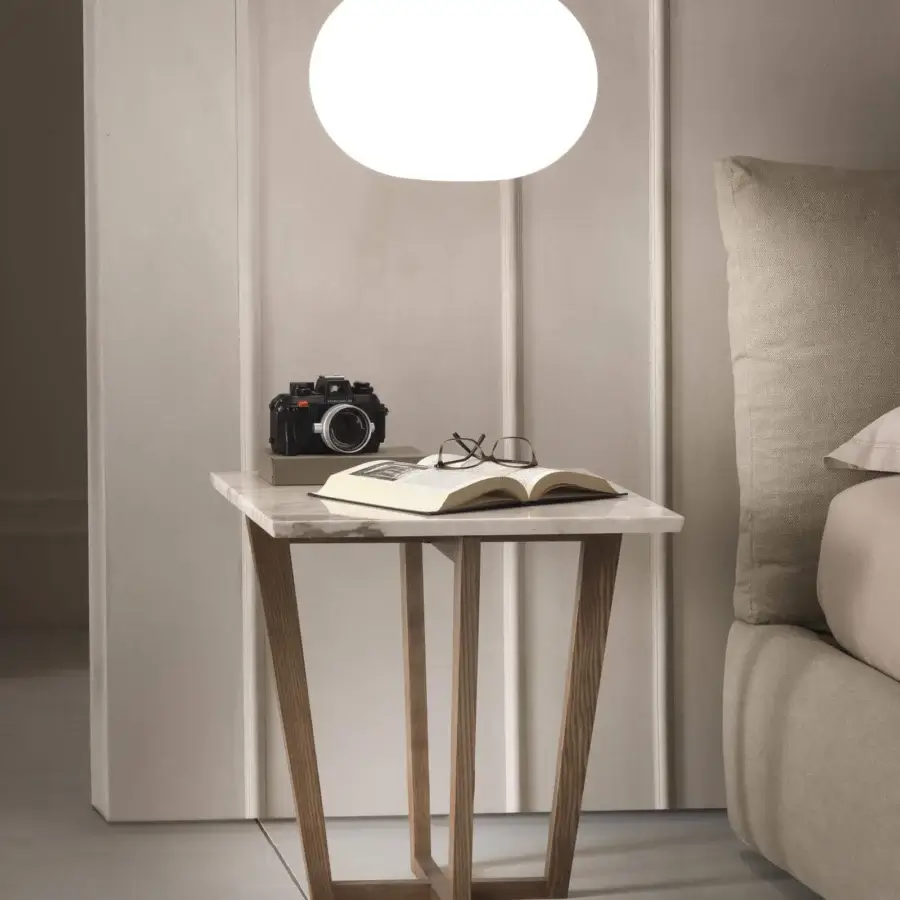 Exceptional Pacini & Cappellini City coffee table with a veneered wood base and polished marble top exhibiting subtle veining