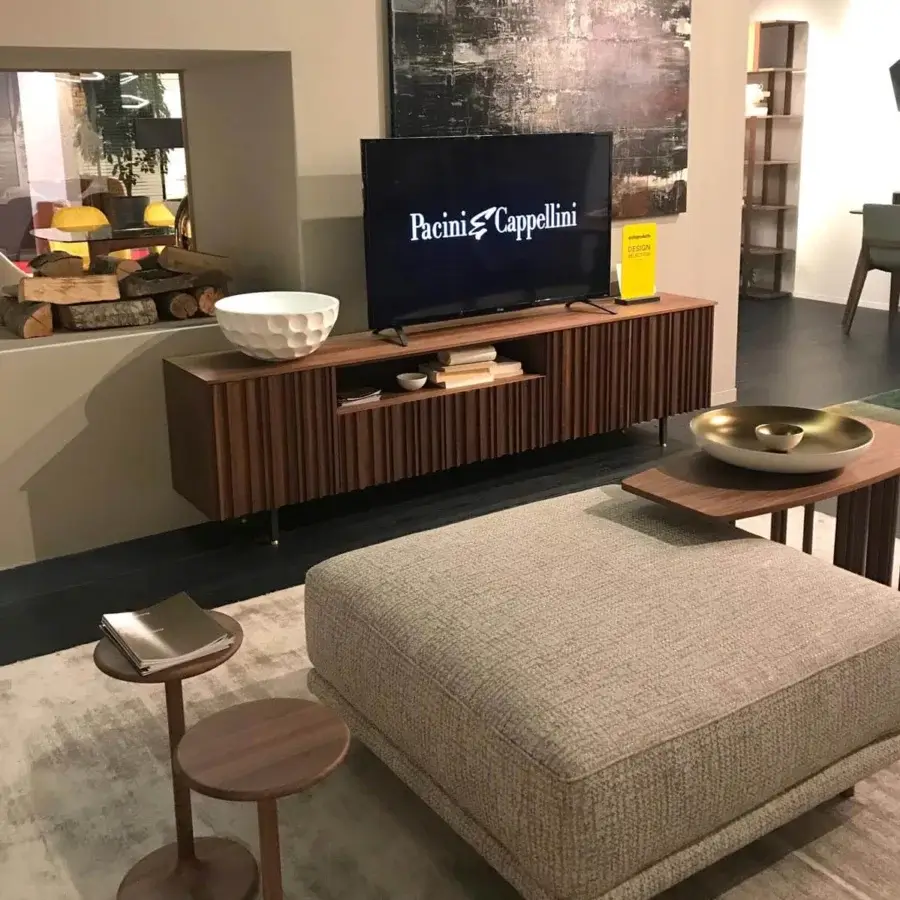 Sophisticated Pacini & Cappellini Line TV stand crafted in medium brown veneered and solid wood with graphite metal base and brass tips