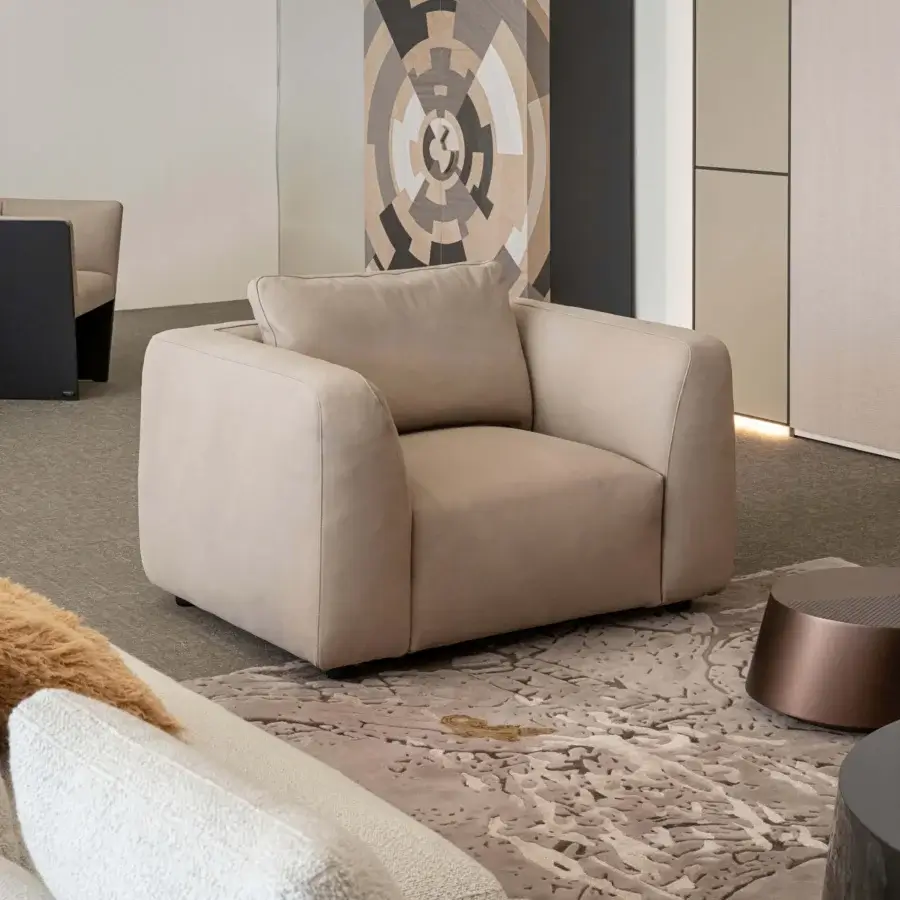 Superior Bizzotto Italia Kumo lounge chair with plush light tan fabric and lacquered metal structure