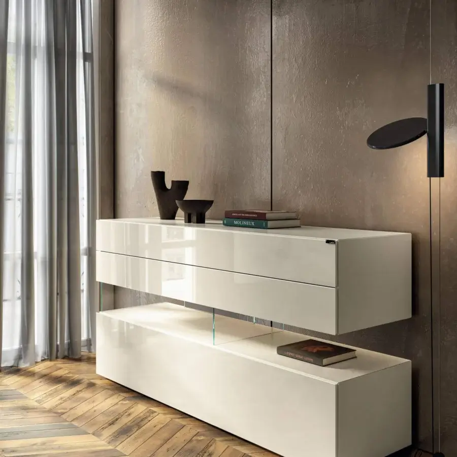 Innovative Lago Air dresser with glossy cream finish and imperceptible extra-clear tempered glass support
