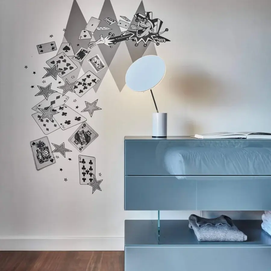 Elegant Lago Air dresser with light blue glossy finish and extra-clear tempered glass, showcasing unique geometric construction with aluminum filigree