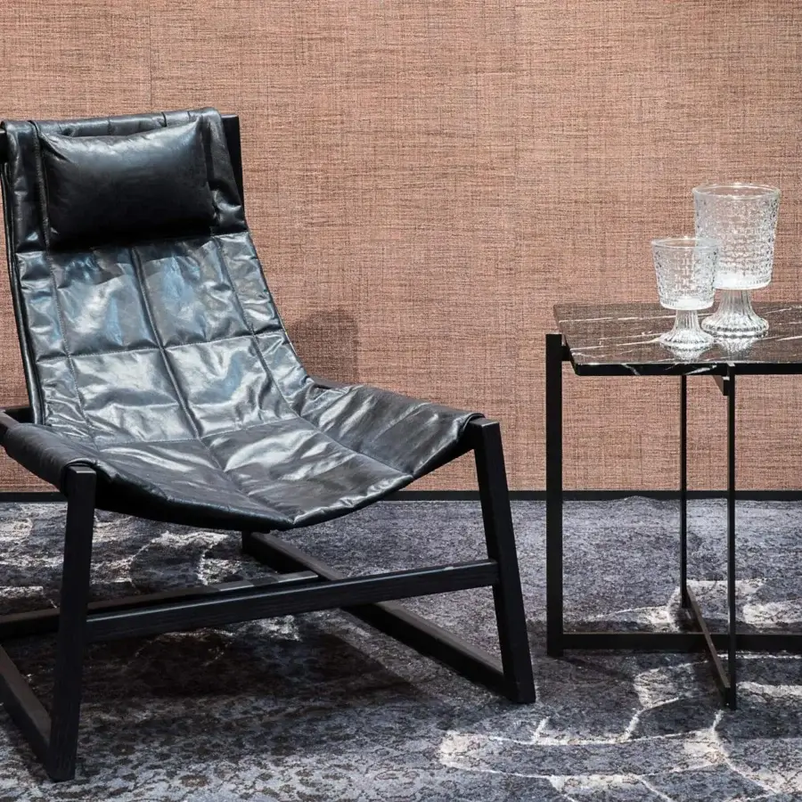 Distinguished Pacini & Cappellini relax lounge chair with black quilted seat and solid wood frame built with glossy material
