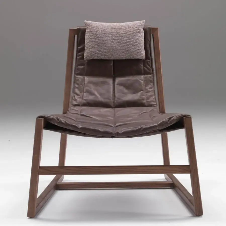 Superior Pacini & Cappellini relax lounge chair with stitched brown leather seat and solid wood frame