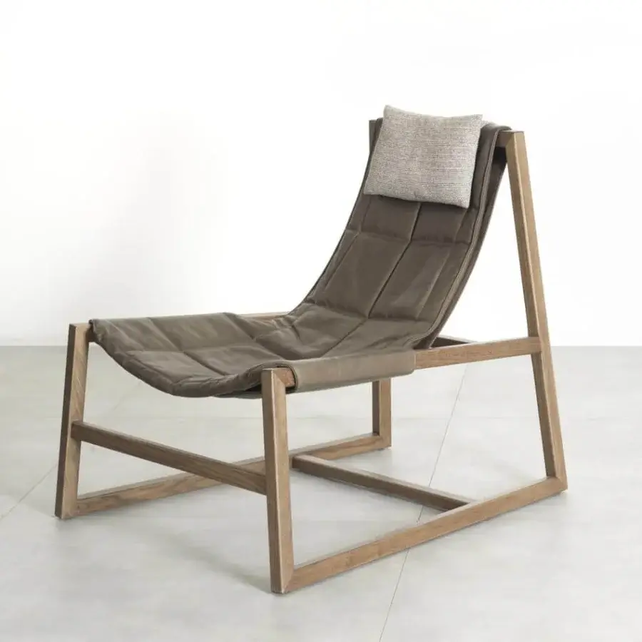 Distinguished Pacini & Cappellini relax lounge chair with padded brown leather seat and light grey pillow