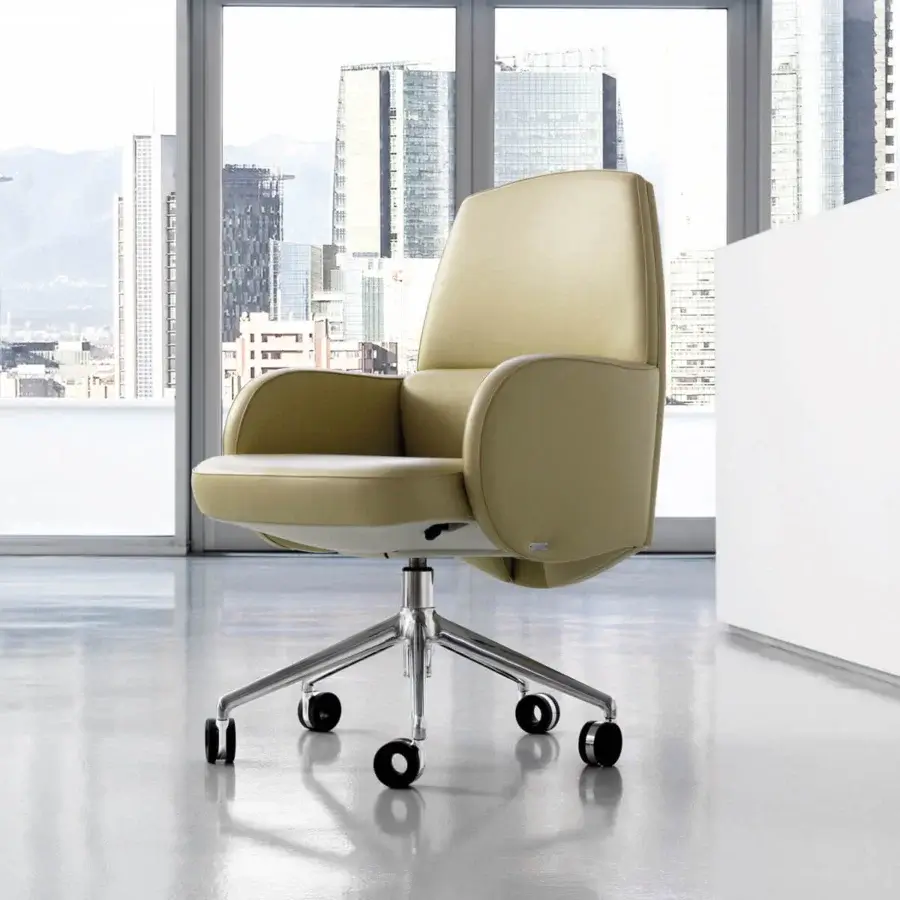 Exceptional Mascheroni Studio armchair in light beige synthetic material with smooth finish and polished metal base with rotating castors
